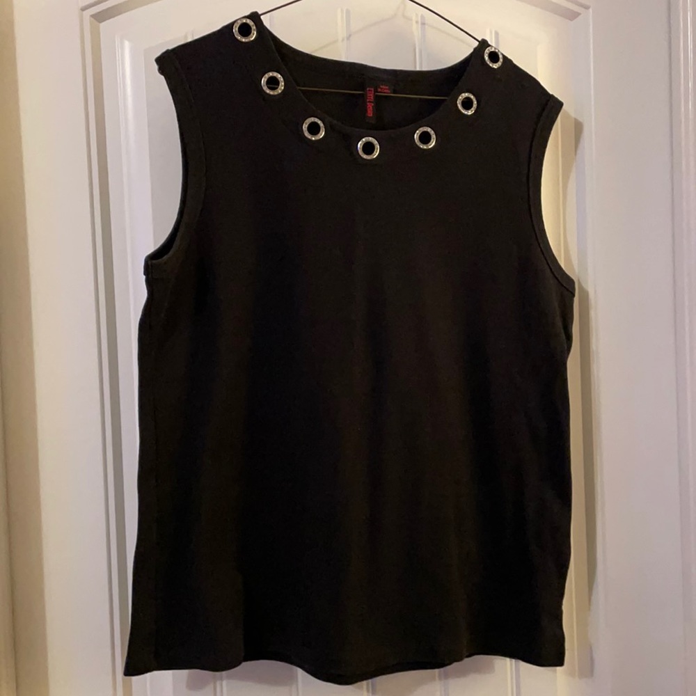Sleeveless top with rhinestone trim on front neckline. fun under jean jacket